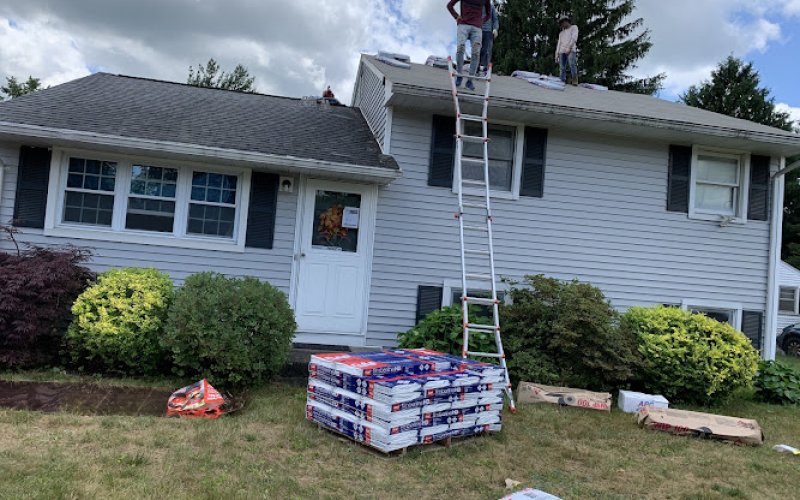 Roofing King LLC — Gutter cleaning service in Waterbury